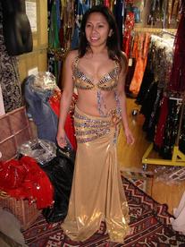 Rowina of the Baltimore Daughters of Rhea Daughters of Rhea Dance Ensemble tries on a Pharaonic style costume