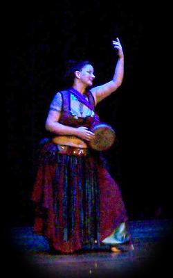 Sara Beth dances while playing drum to Rhea's Sibek choreography at Belly Dance Magic 2007