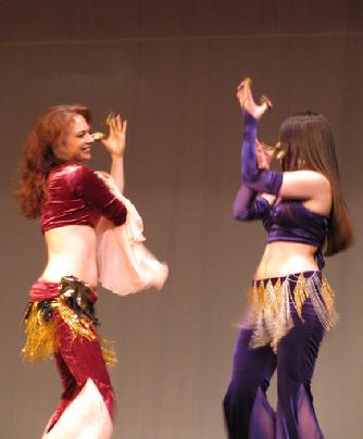 Piper and Stephanie of the Baltimore Daughters of Rhea dancing the "Spicy Cymbals" sectionof Raks Kahti