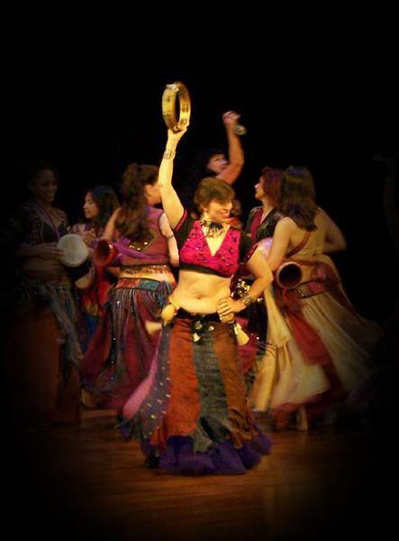 Naramissa plays tambourine in Rhea's "Sibek" choreography at Belly Dance Magic 2007